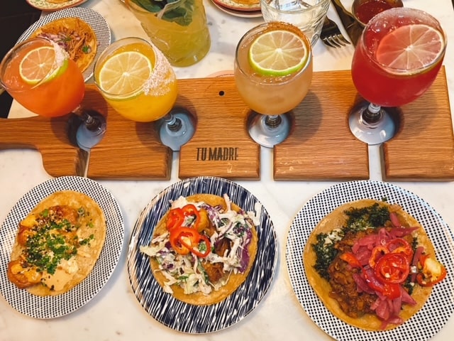 Since 2015, Tu Madre has been satisfying hungry customers with delicious tacos, bowls, breakfast burritos, and handcrafted margaritas made with "flavors from across the city with a diverse array of ingredients."