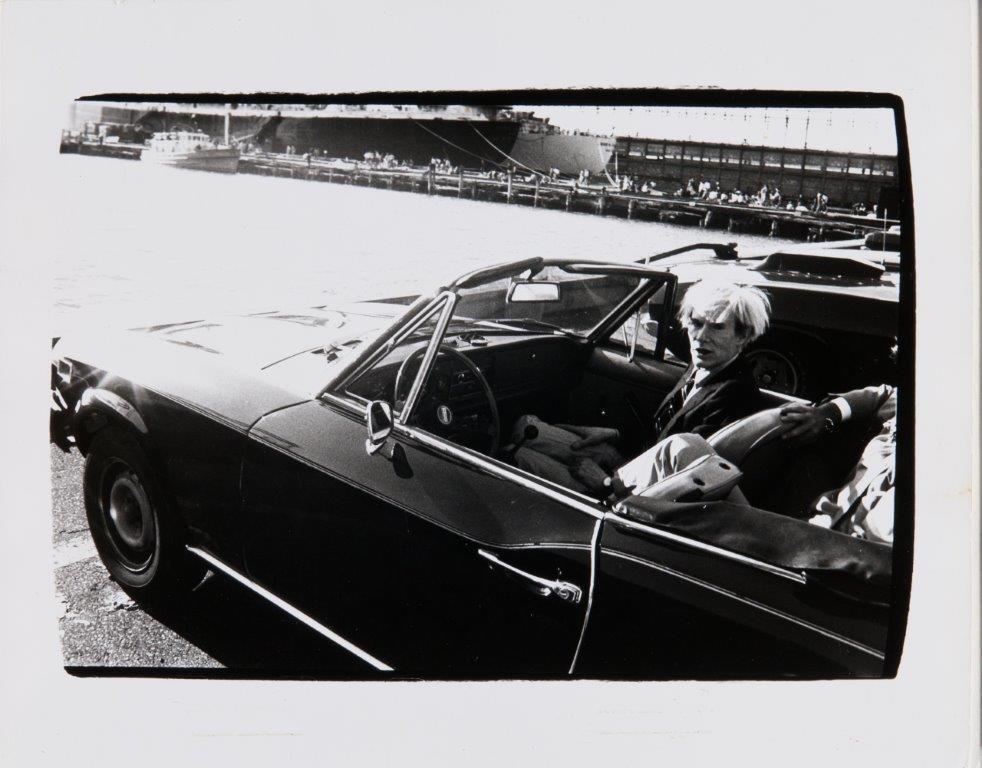 Newly opened multi-purpose studio space SIZED STUDIO is pleased to announce In Motion: Andy Warhol 1974 - 1986, an exhibition of Andy Warhol photography hosted in partnership with O’Gara’s Rolls-Royce Beverly Hills. Here Warhol is photographed in a convertible. Photo credit: SIZED STUDIO and O’Gara’s Rolls-Royce Beverly Hills - In Motion: Andy Warhol 1974 - 1986