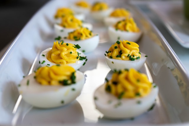 On a low-carb plan AVOID high carb foods like grains, potatoes, sugary drinks and processed junk foods. You are and ENCOURAGED to eat fish, eggs, nuts, seeds, vegetables, fruits, and healthy fats. A great low-carb snack are deviled eggs.