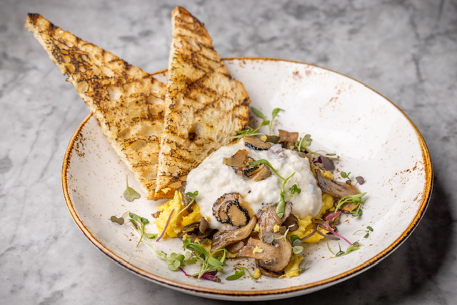 Beverly Grove neighborhood’s world-renowned Negroni 3rd Street restaurant launches weekend brunch! Menu highlights include Truffle Eggs (with scrambled eggs, truffle stracciatella, and sautéed mushrooms over sourdough toast). Photo Credit: Jakob Layman