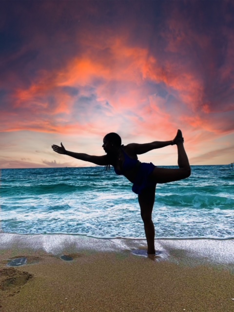 A  woman is doing a yoga pose on a beach with a beautiful sky. So now you see how doing yoga detoxes you from the inside out, and  can literally help you age backwards, physically and mentally. So is yoga the fountain of youth? I challenge you to take a class and see for yourself. Namaste.