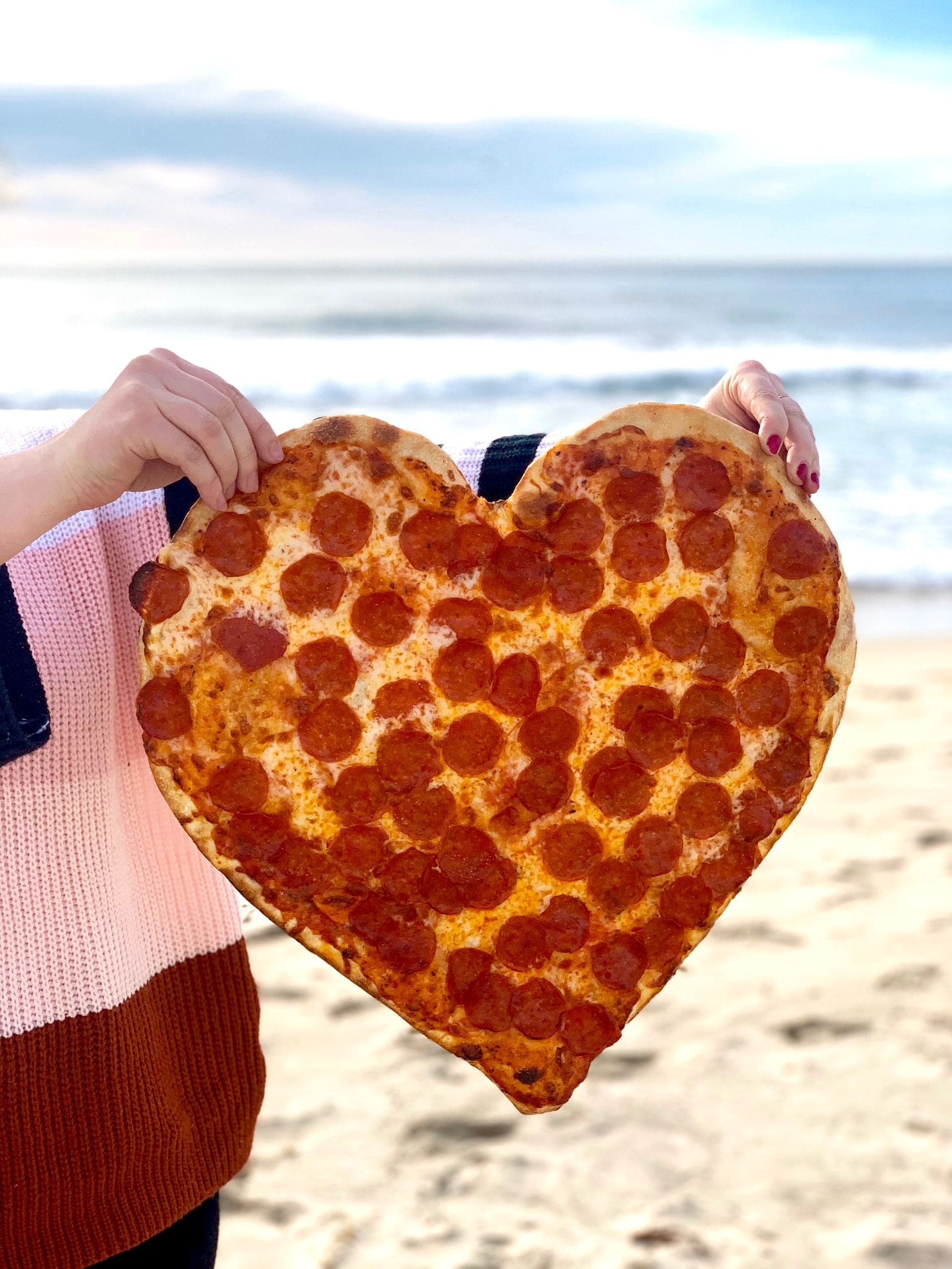 A photo of Mickey’s Italian Deli and Pizzeria's heart-shaped pizza.