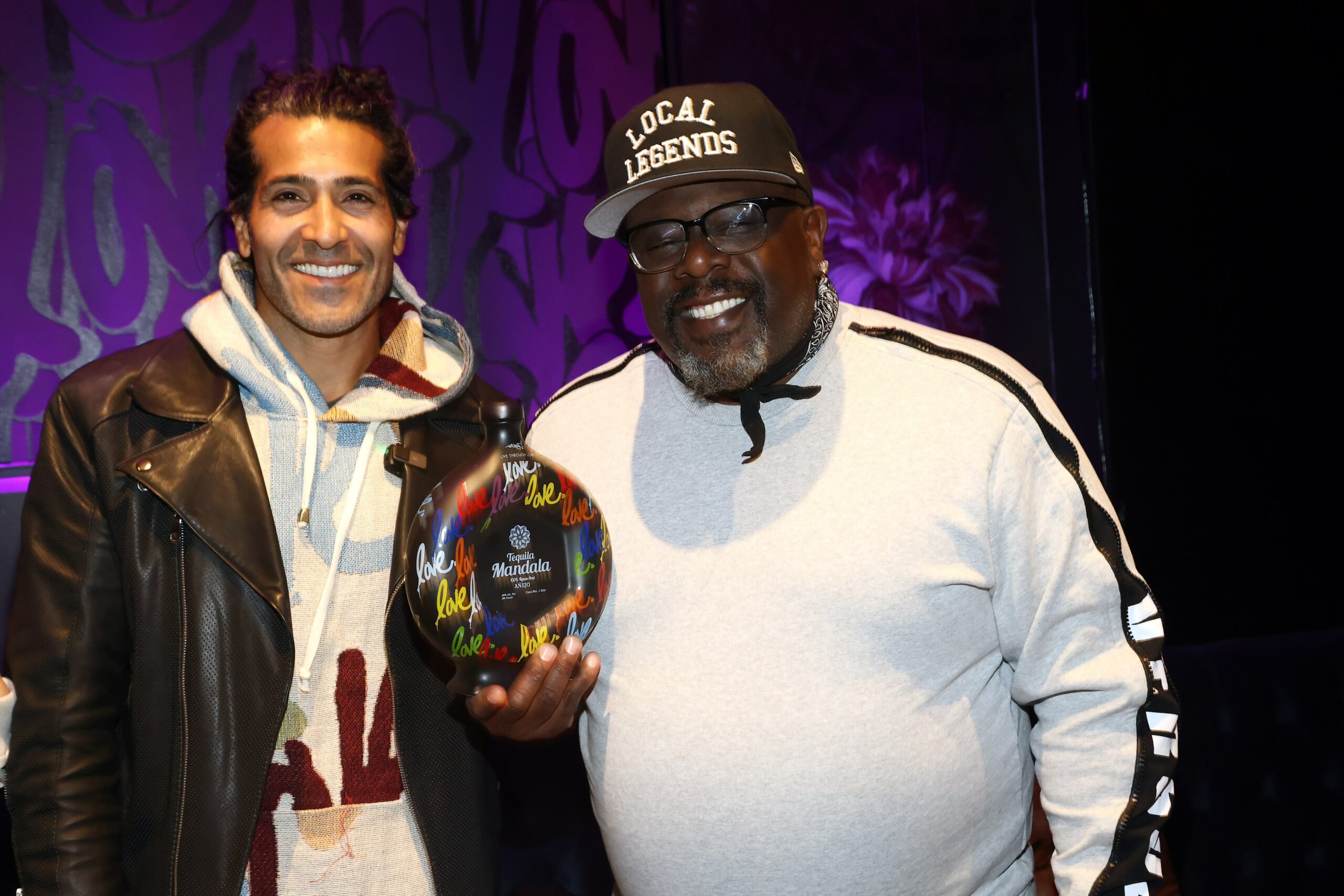 A photo of artist Ruben Rojas and actor and comedian, Cedric the Entertainer