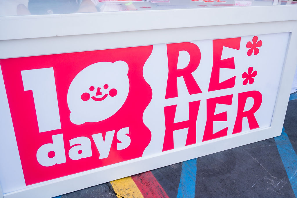 A photo of a sign for Regarding Her’s (RE:Her) 10-Day Festival