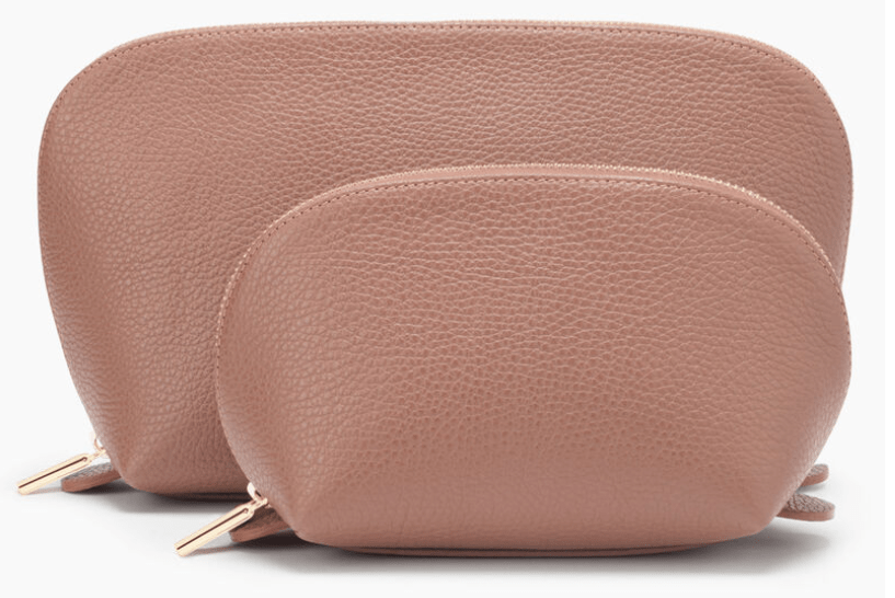 An image of leather makeup/toiletry/jewelry bags from Cuyana, perfect for the jetsetting Mom.
