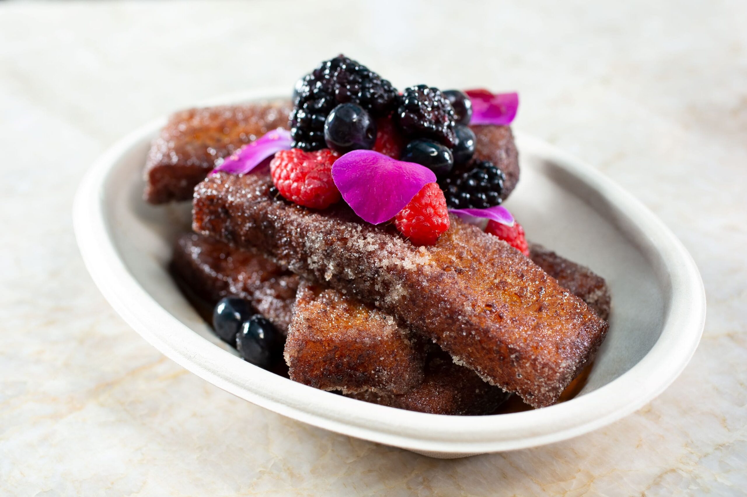 An image of the Churro French Toast from Que Padre weekend breakfast.