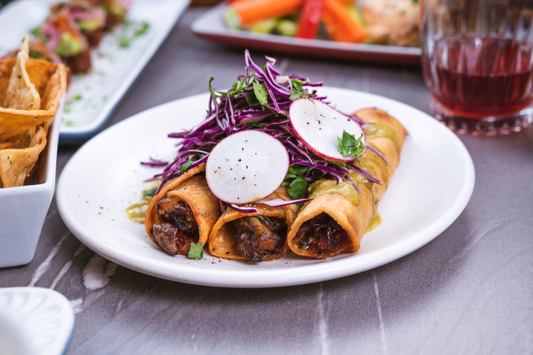 An image of the new Fire Roasted Eggplant Taquitos from Lemon Poppy Kitchen.