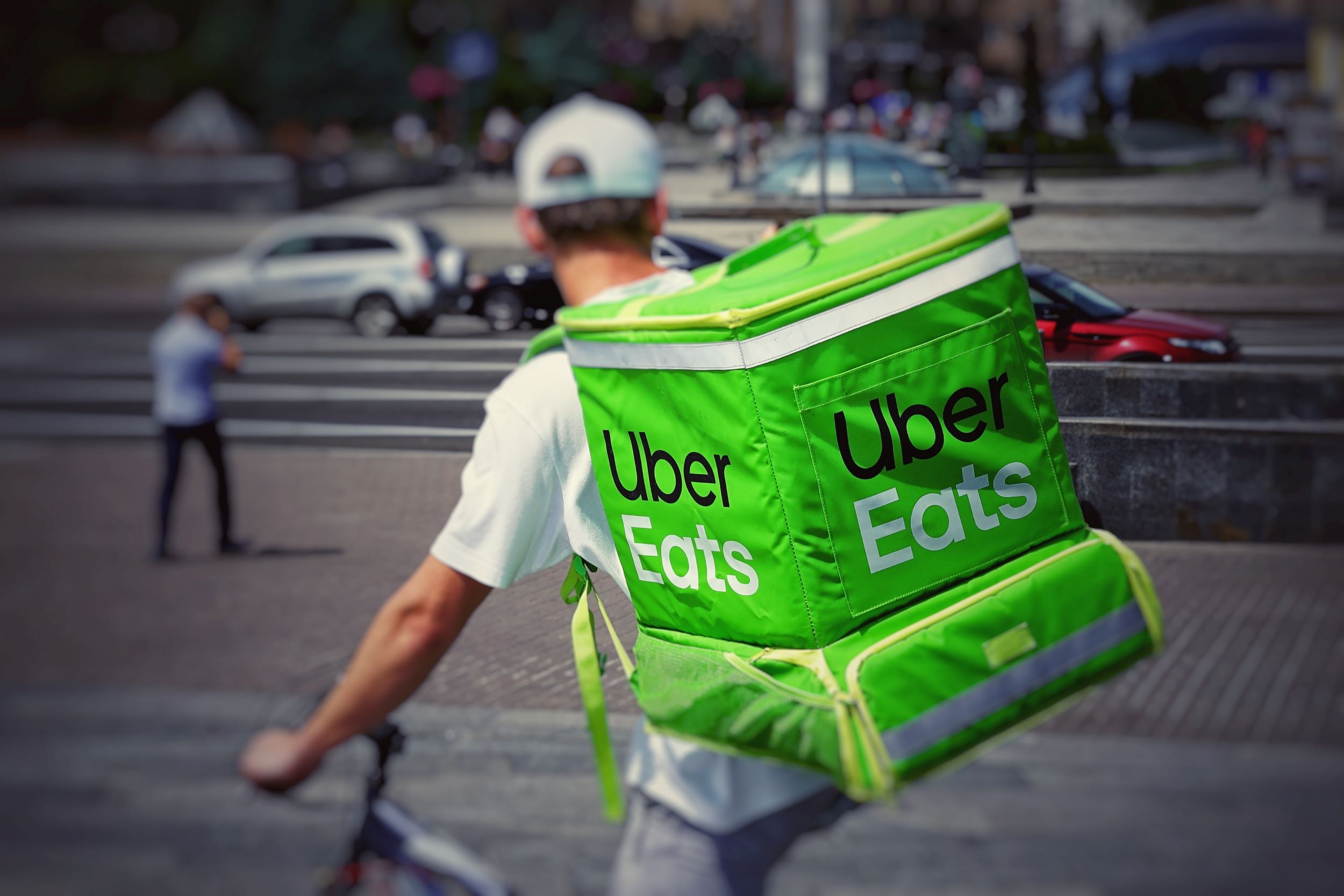 An image of an Uber Eats food courier.
