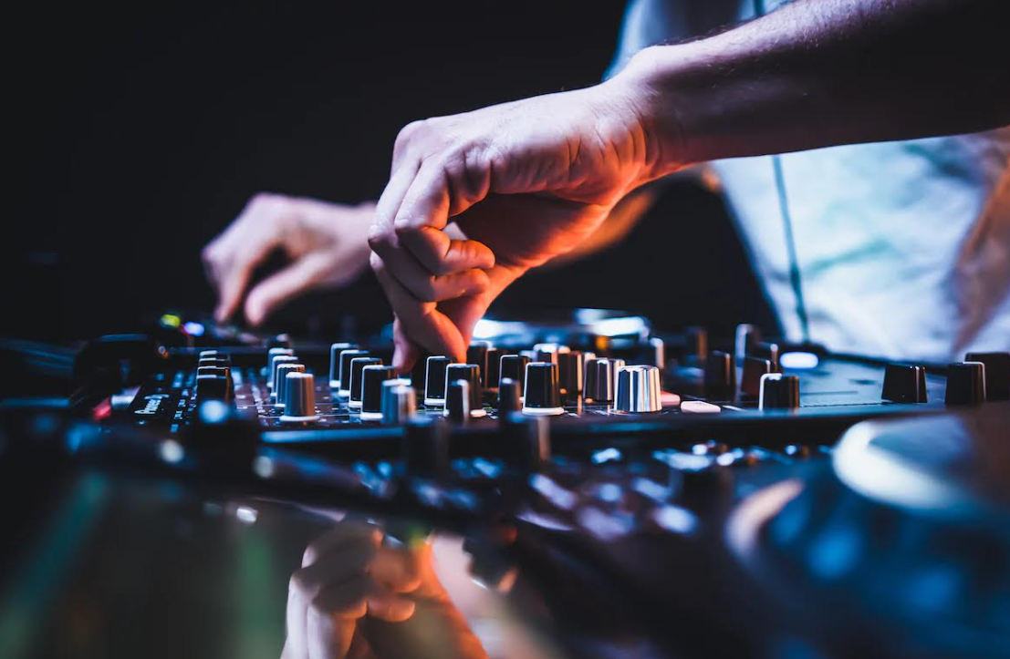An image of a DJ spinning music.