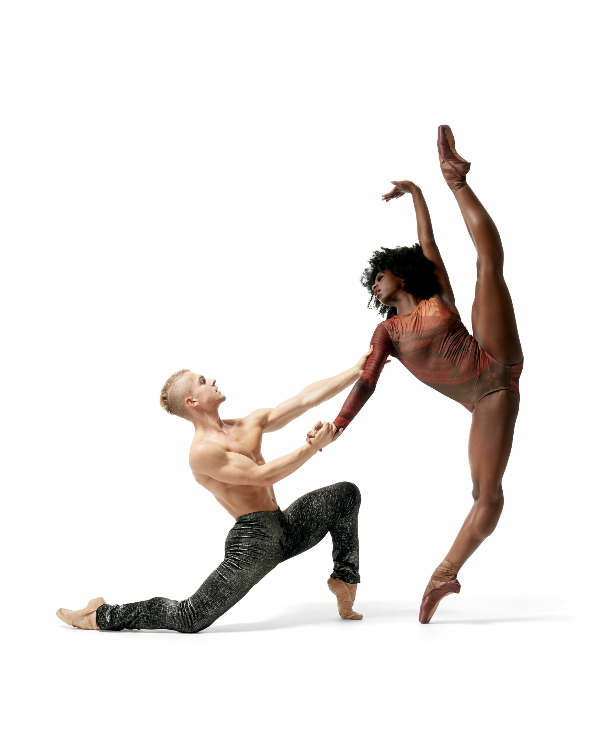 An image of a male and female in contemporary ballet poses. 