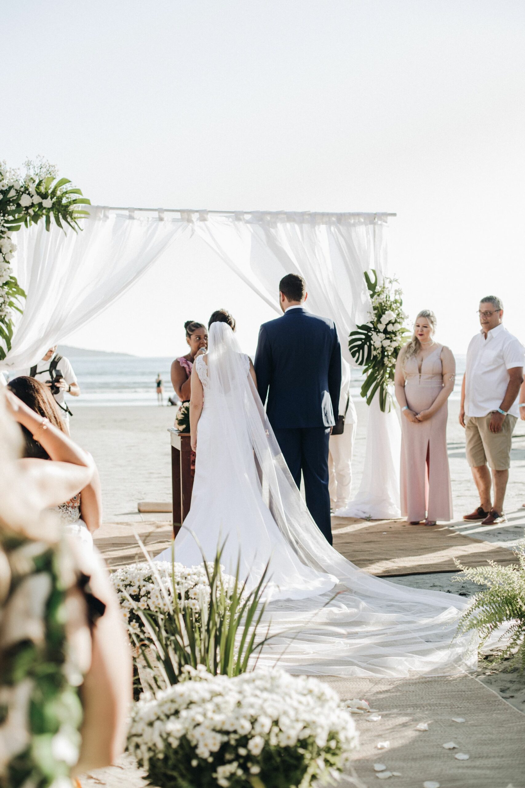 An image of a couple at their beach wedding.
