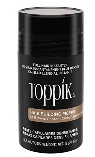 An image of a bottle of Toppik hair fibers.