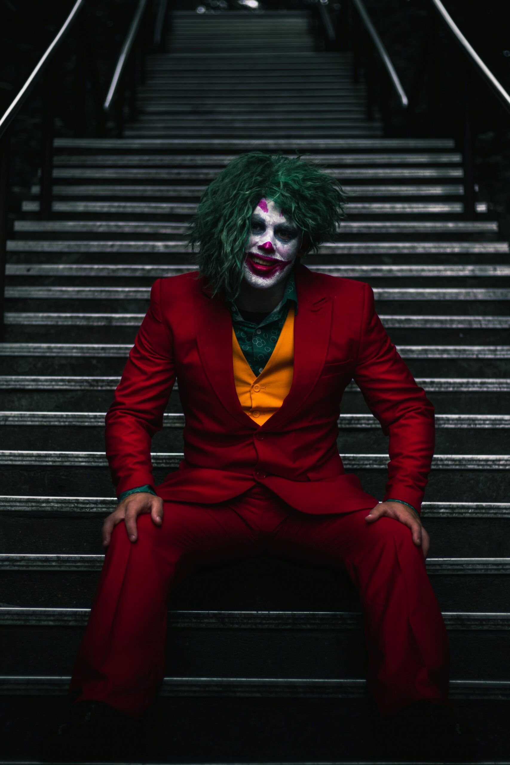 An image of a man dressed in the Joker costume.