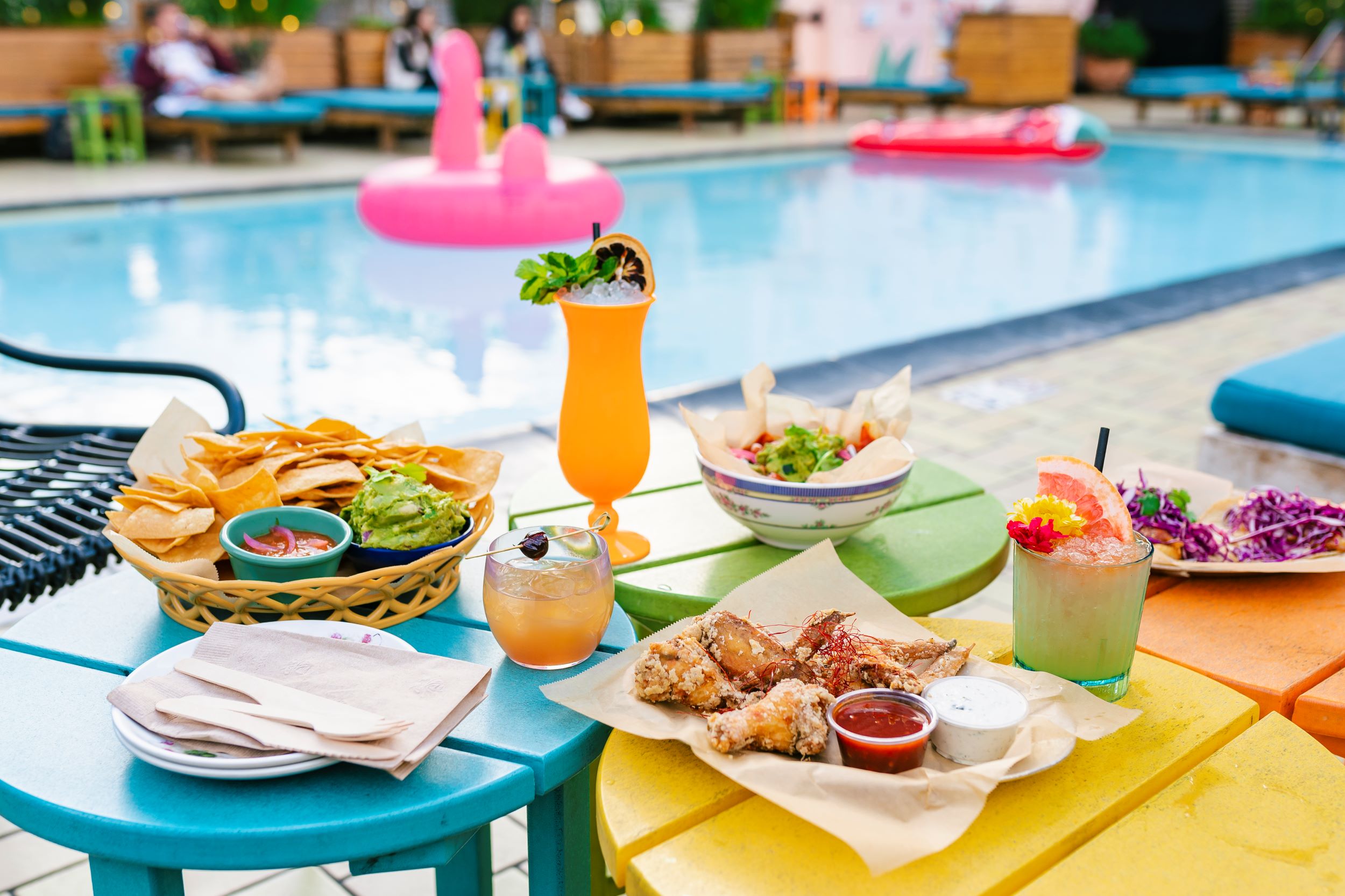 An image of the food and pool at DTLA's Broken Shaker.