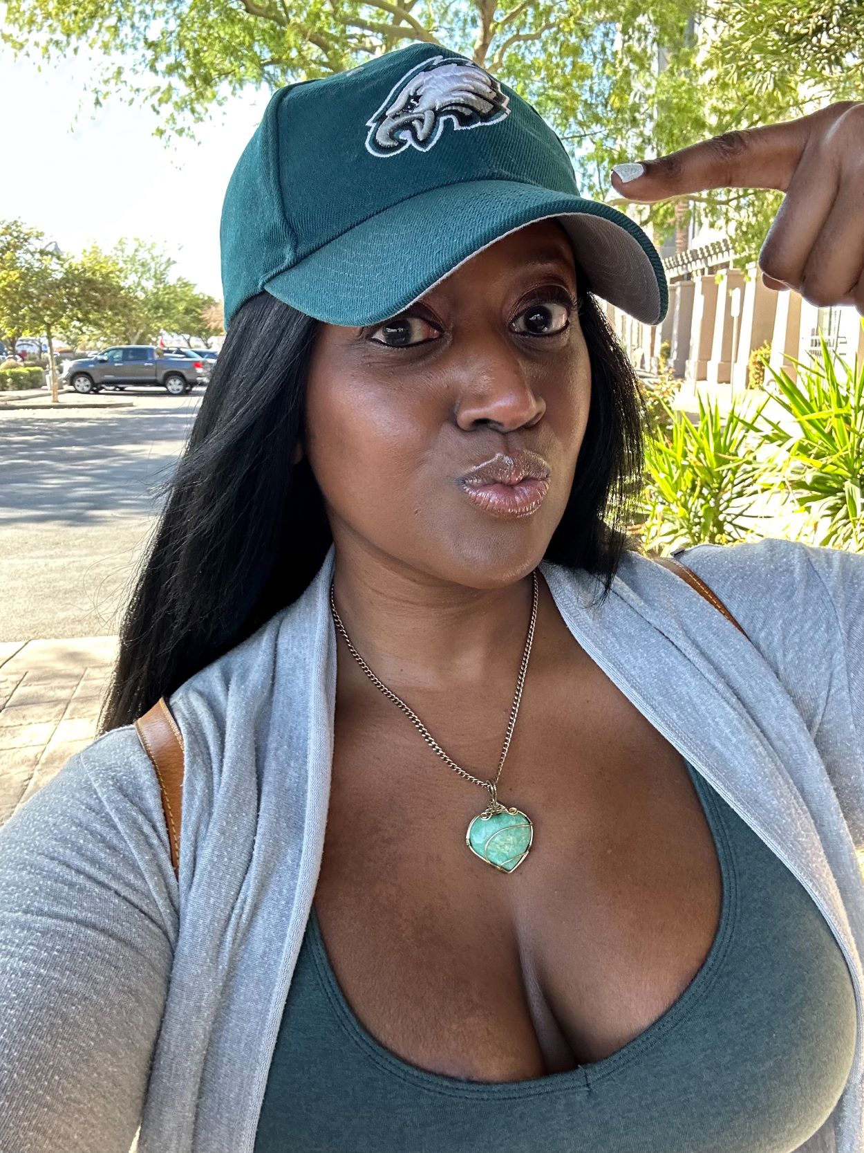 An image of a woman in a Philadelphia Eagles hat.