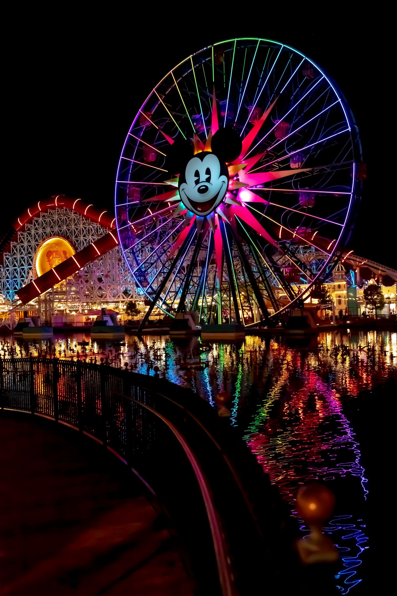 A nighttime image of the Ferris wheel at Disneyland