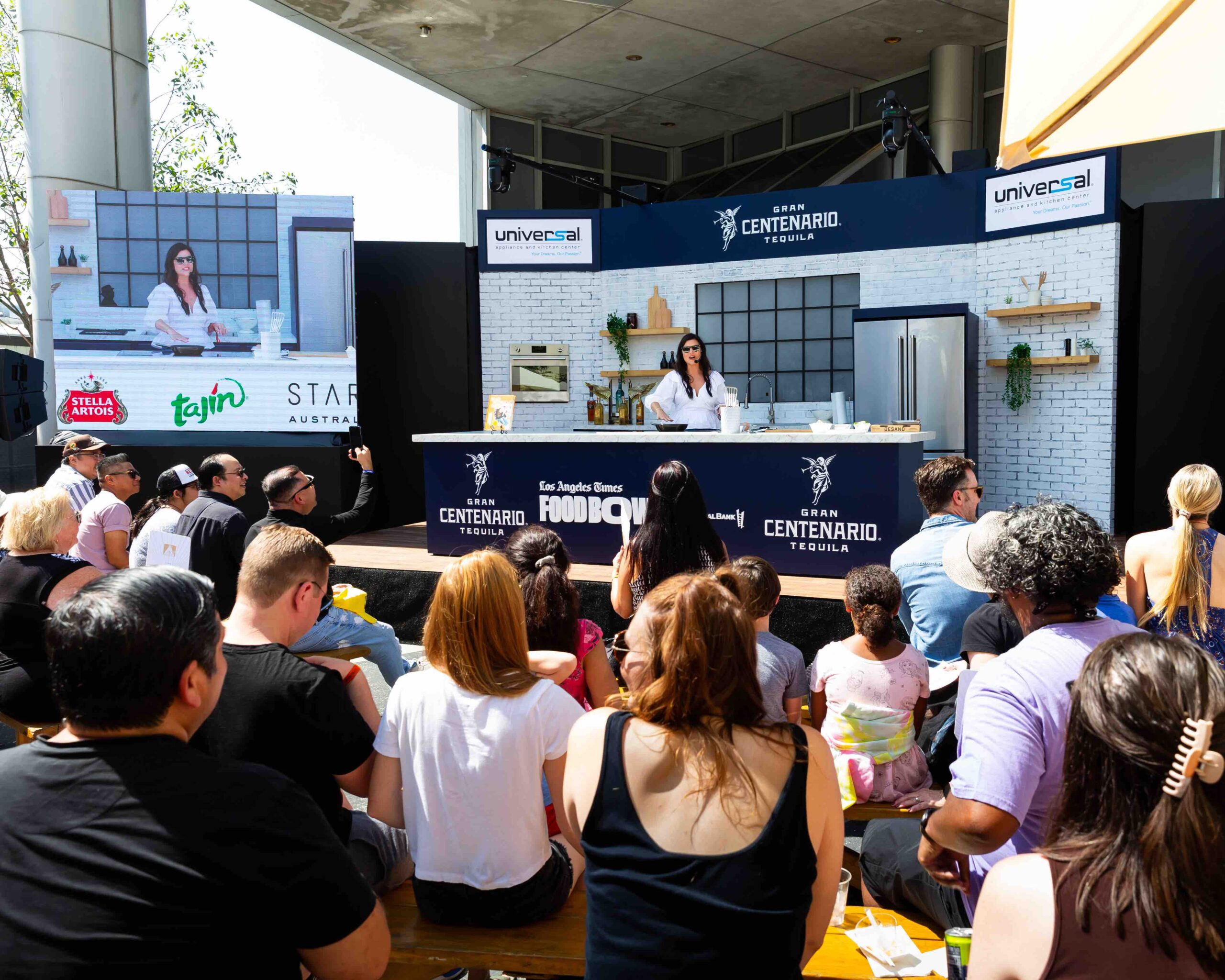 An image of Tiffani Thiessen's live cooking demo from the L.A. Times Food Bowl.
