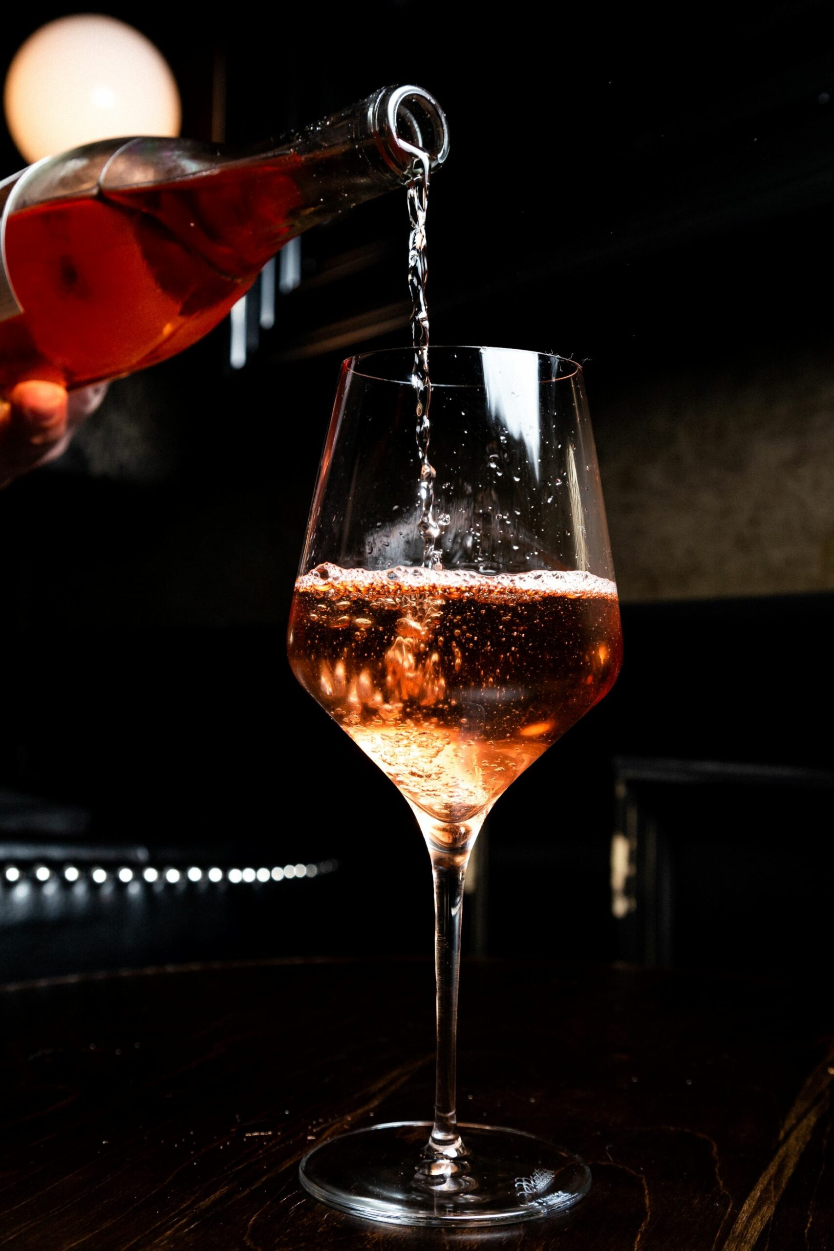 An image of a glass of rose wine.