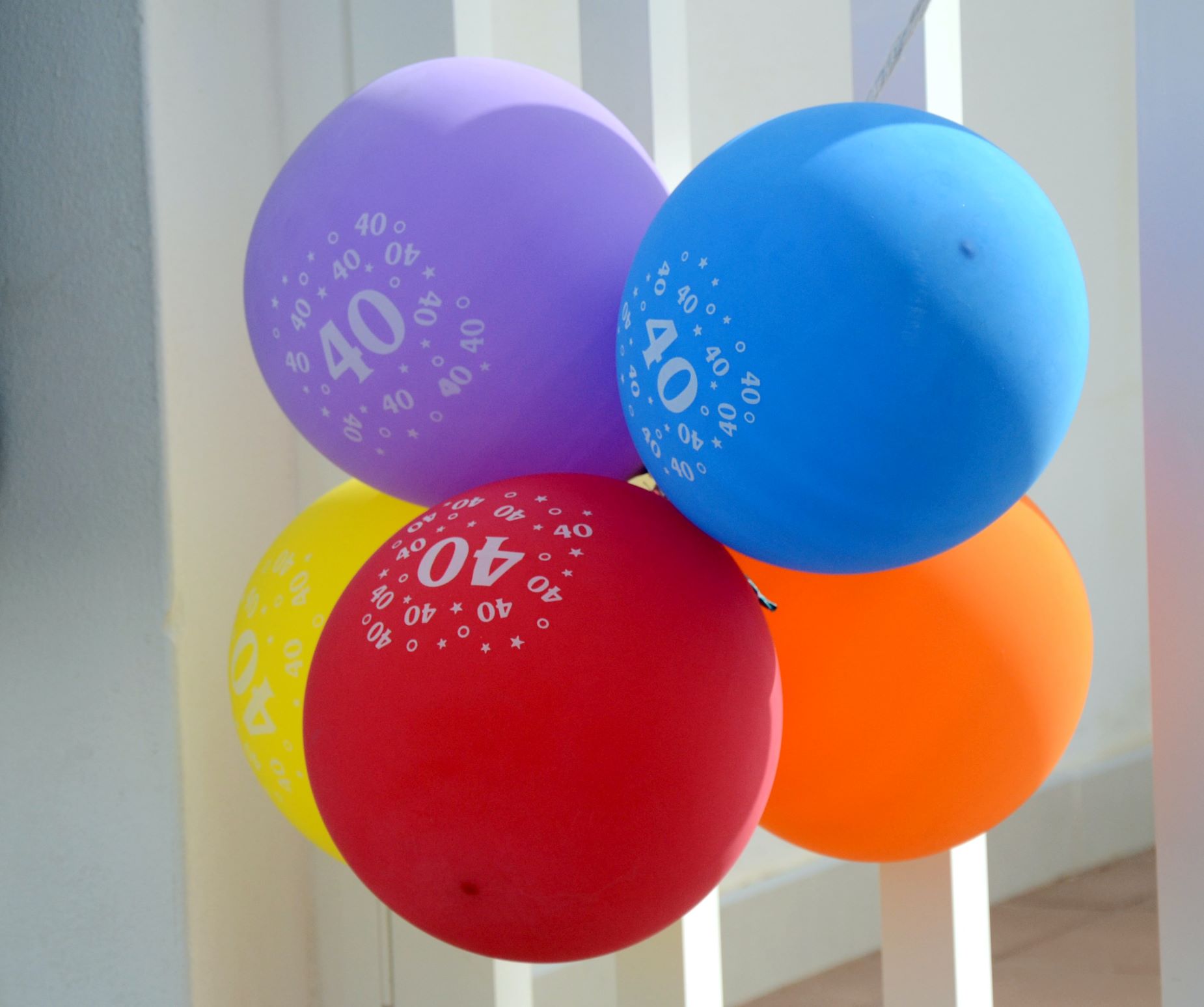 An image of balloons with the number 40 on them.