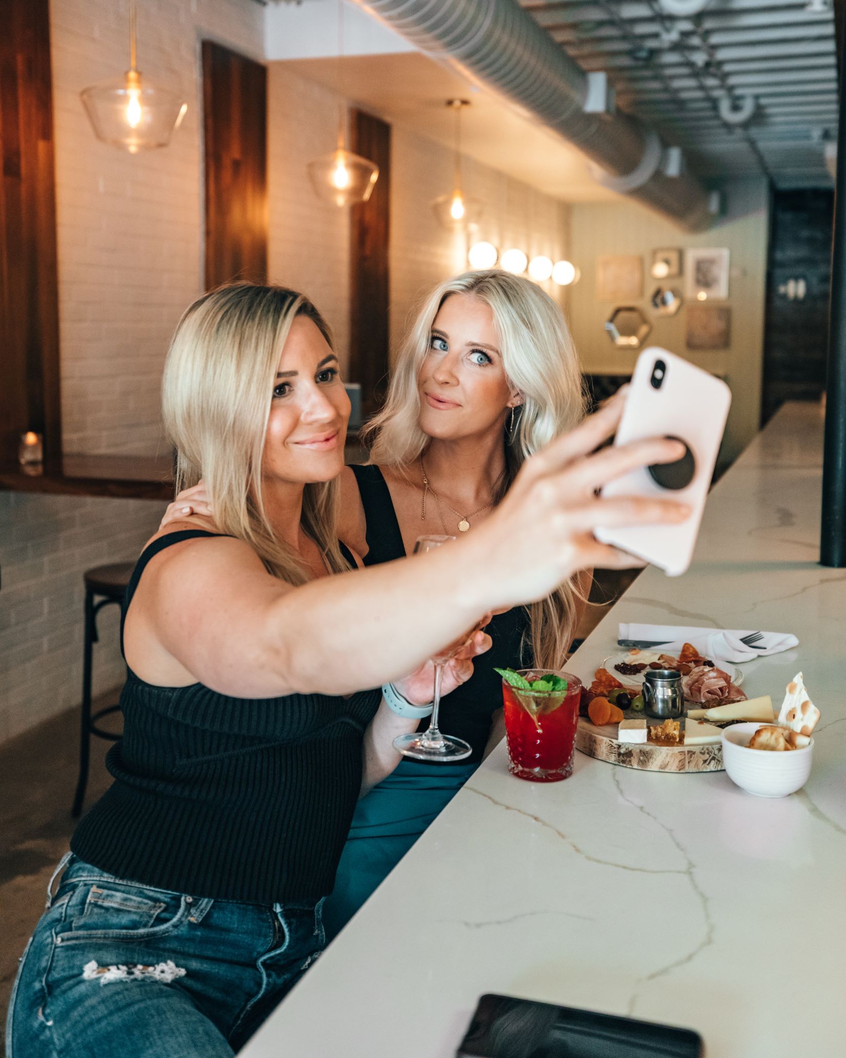 An image of two women taking a selfie