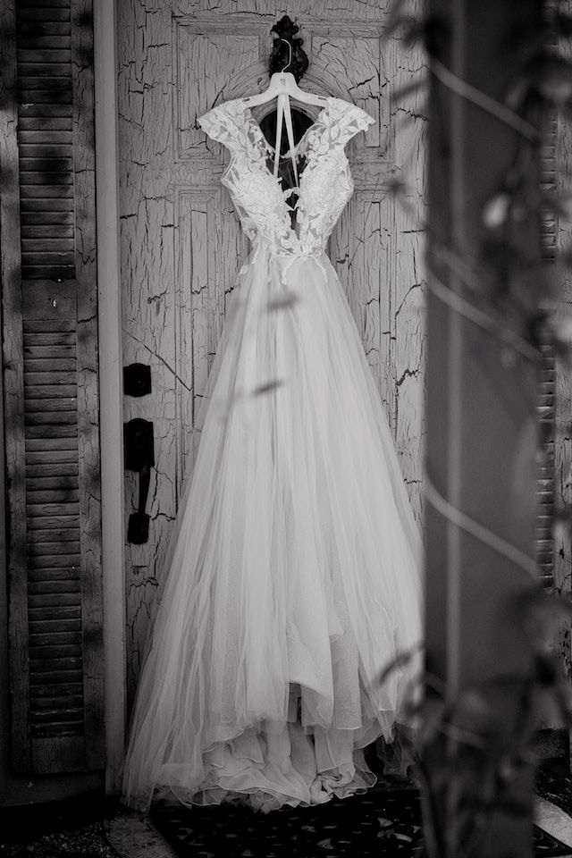 An image of a sexy wedding dress hanging up.