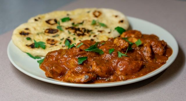An image of Naan and Chicken Marsala.