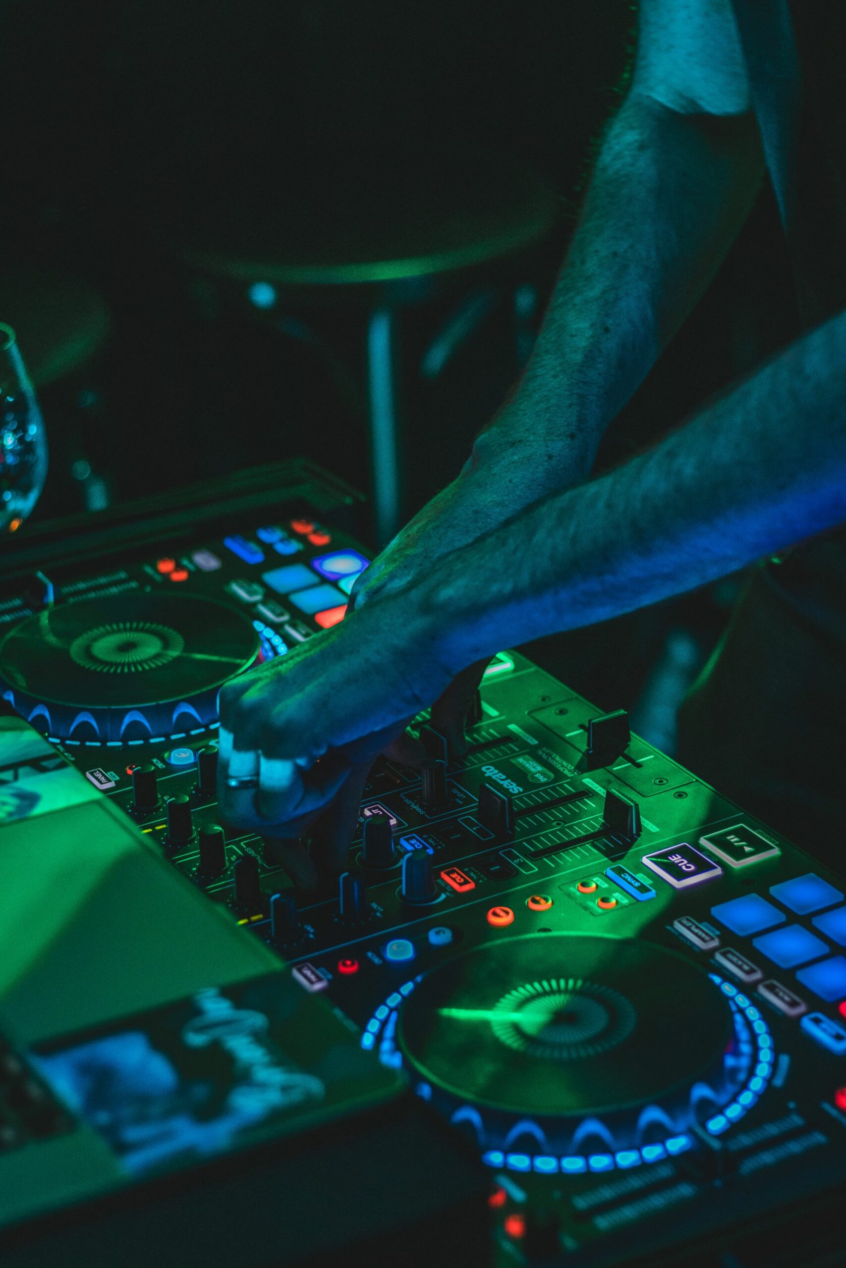 An image of a DJ on the turntables.