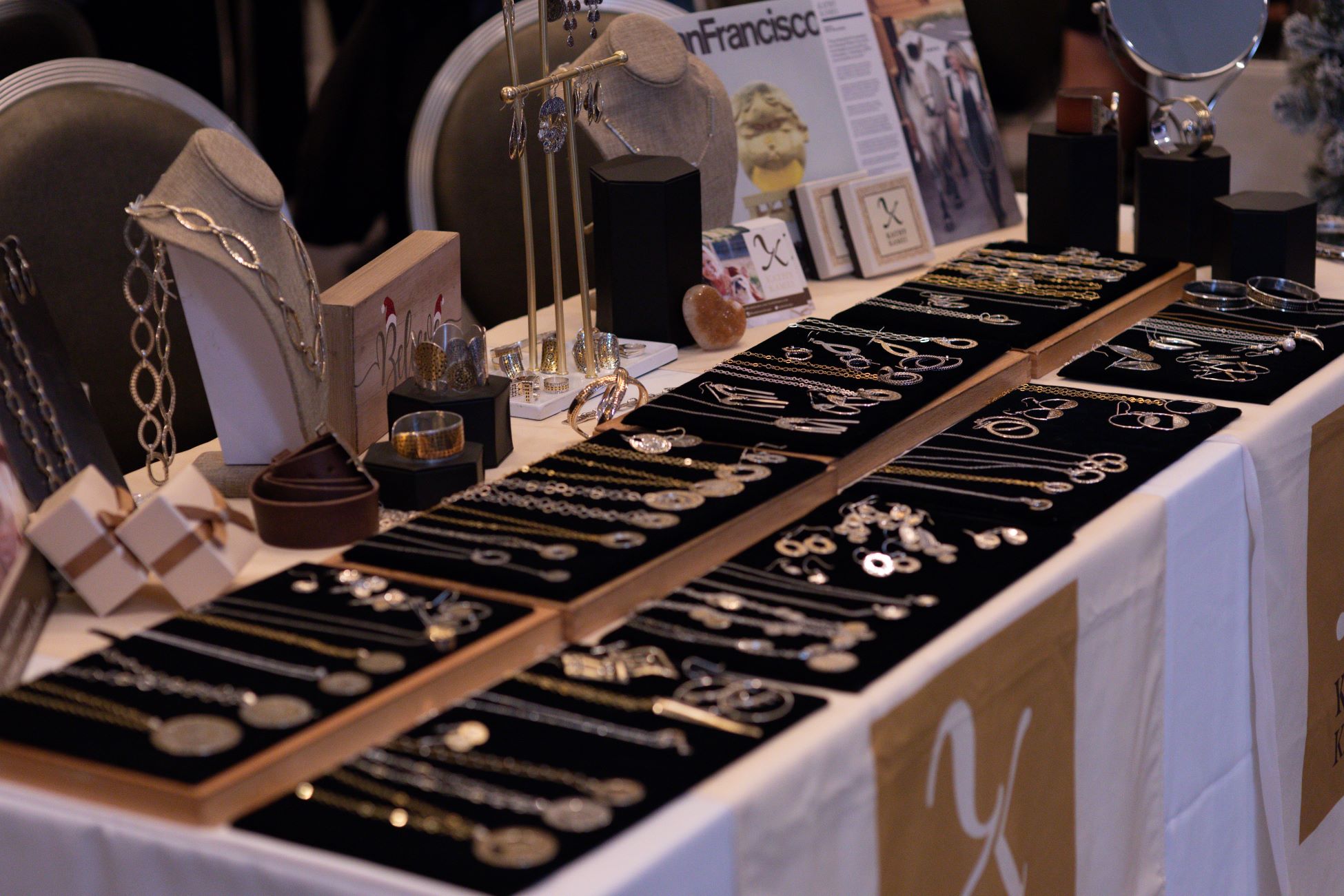 An image of a jewelry vendor at the SLS shopping event.