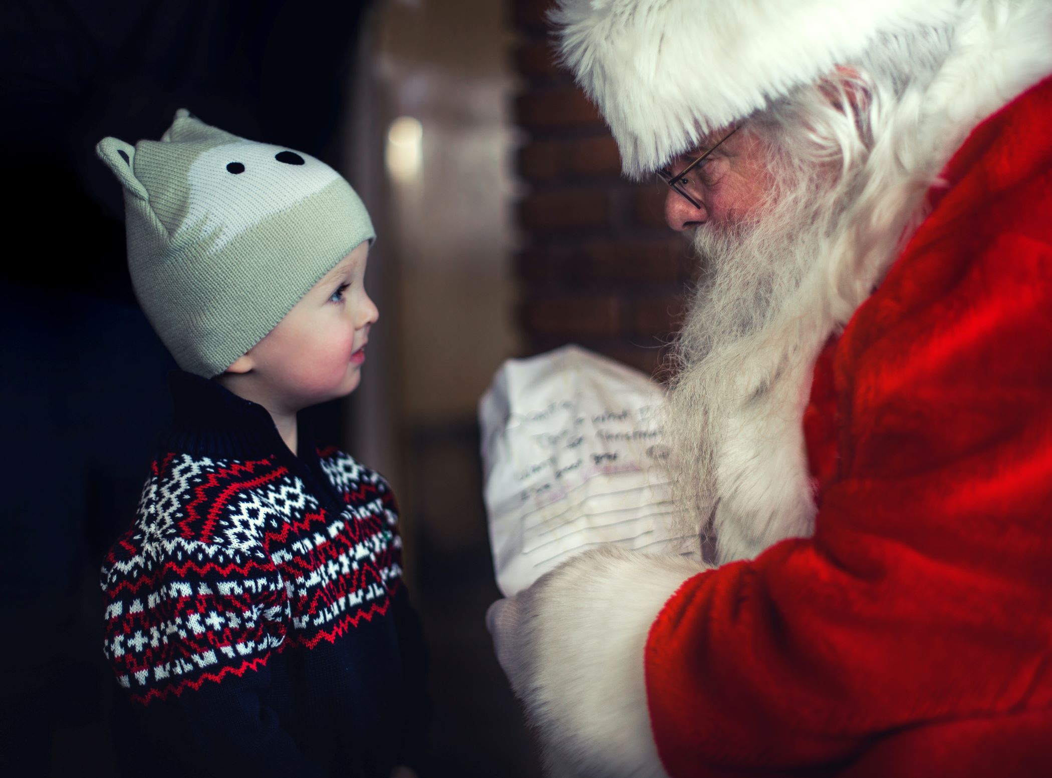 An image of a child with Santa.