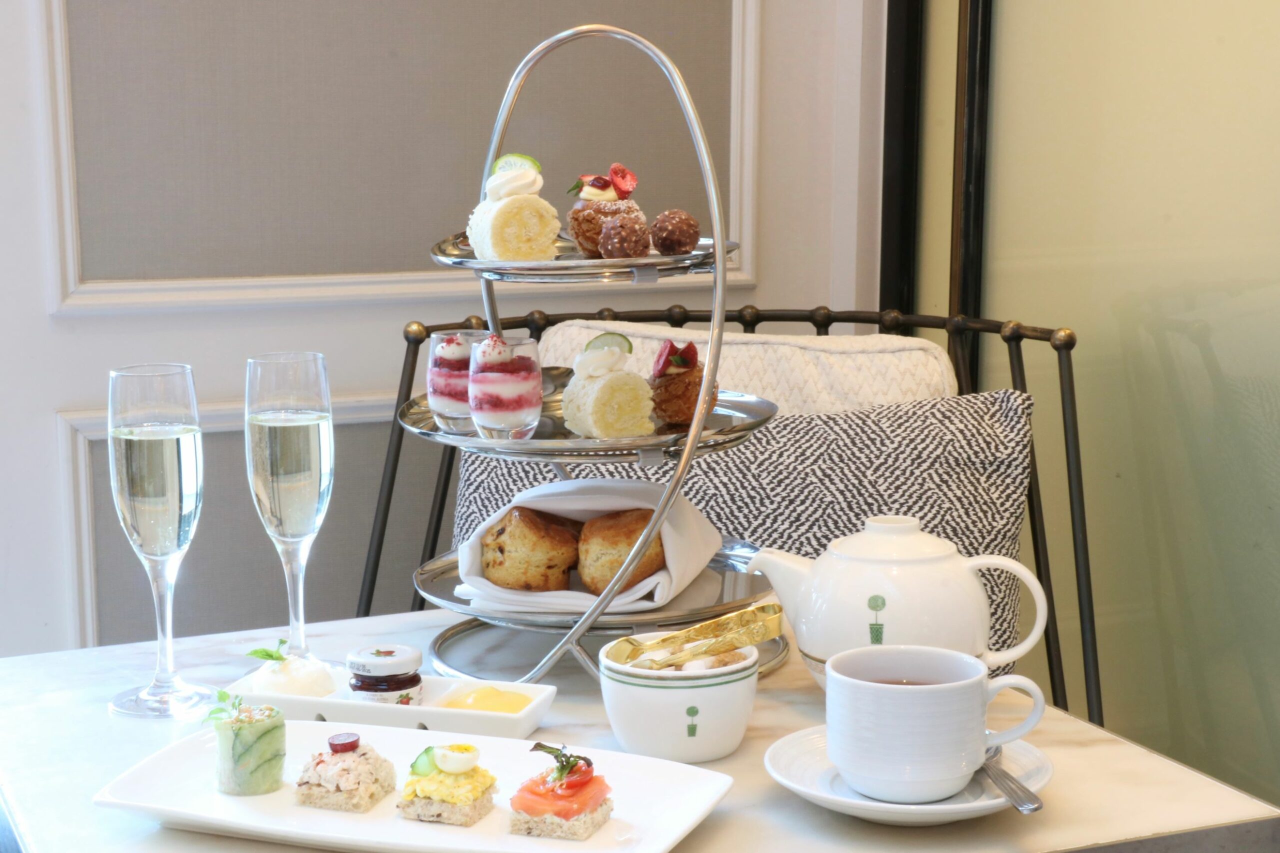 An image of the selectin of sweets, teas, and bubbly at the London's Valentine's themed high tea.