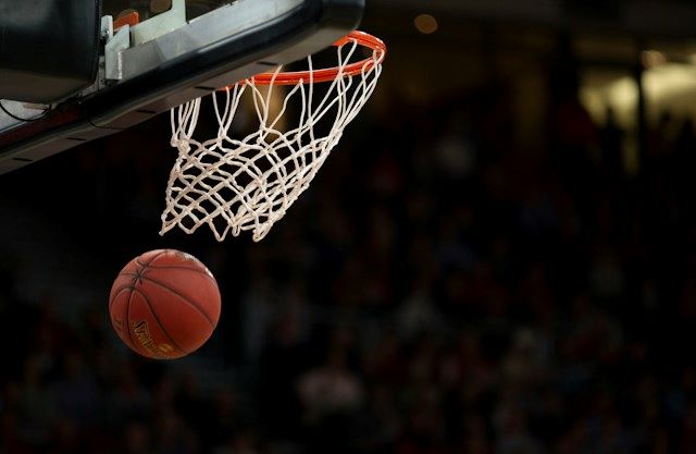 An image of a basketball passing through a net, the inspiration for Intuit dome arena.