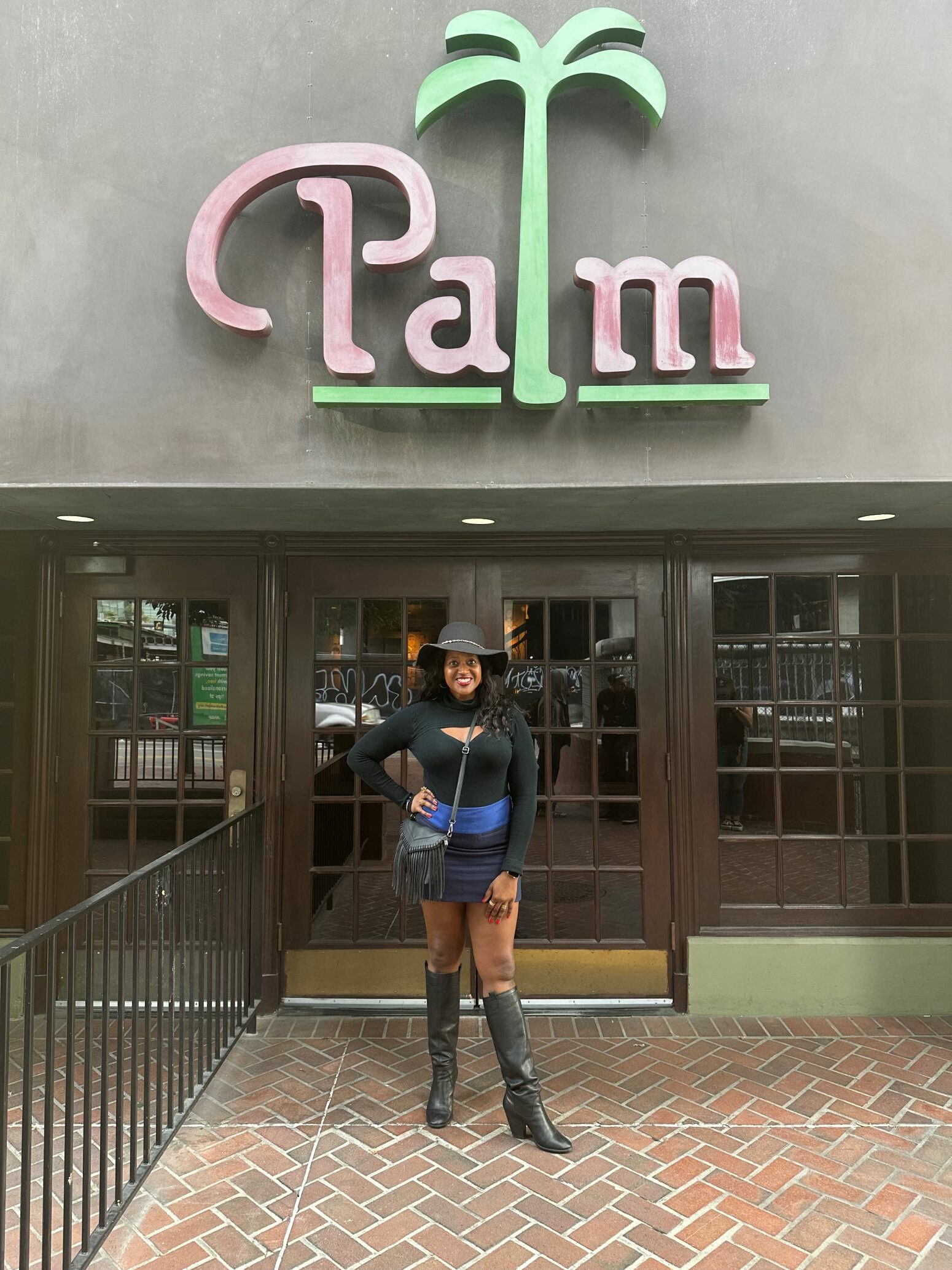 An image of lifestyle blogger Ariel Johns standing outside the Palm Los Angeles.