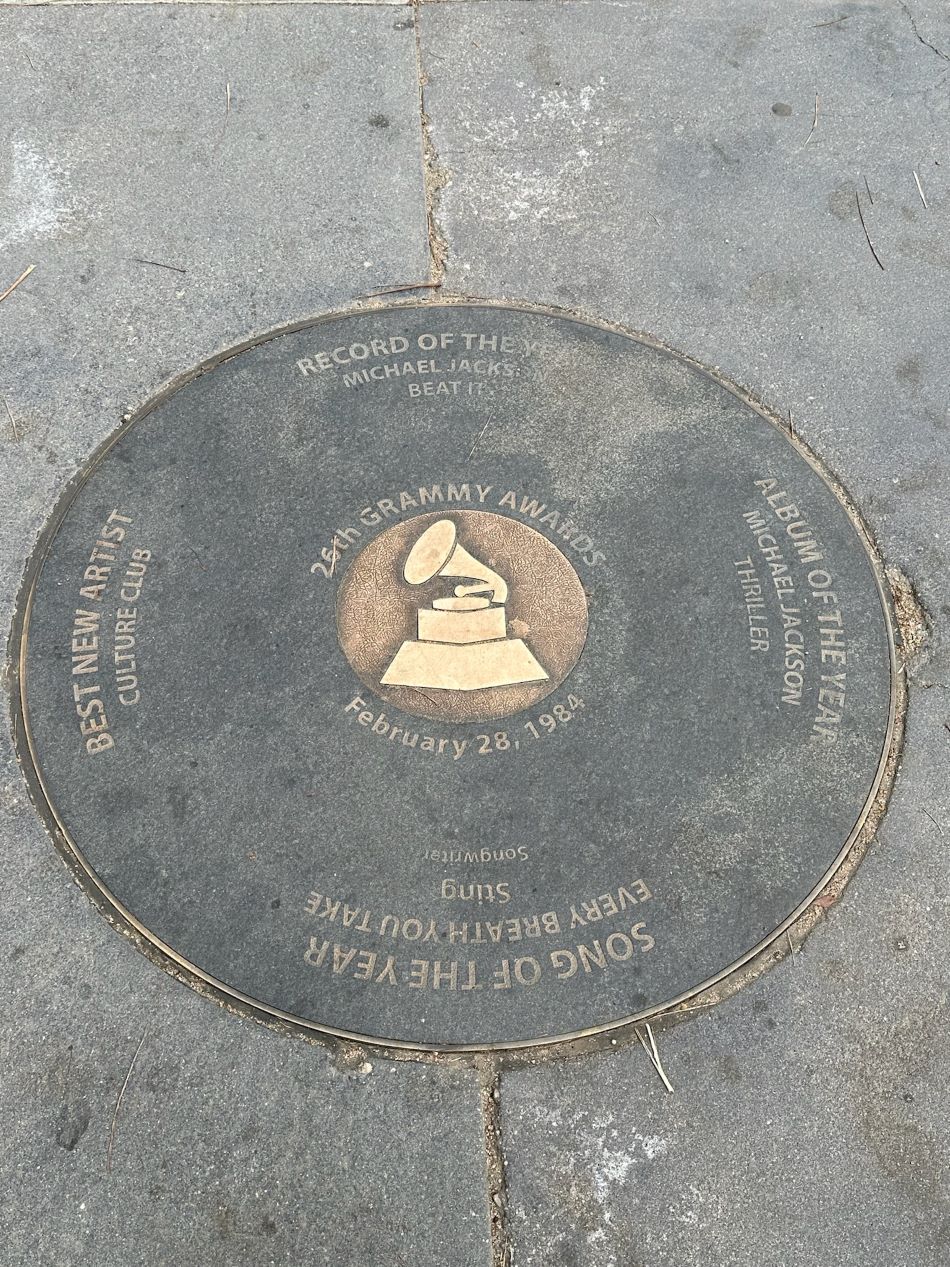 An image of a Grammy award engraved in the street of Los Angeles.