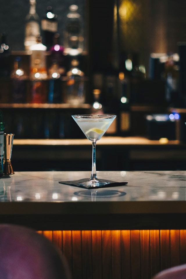 An imager of a martini at a top bar.