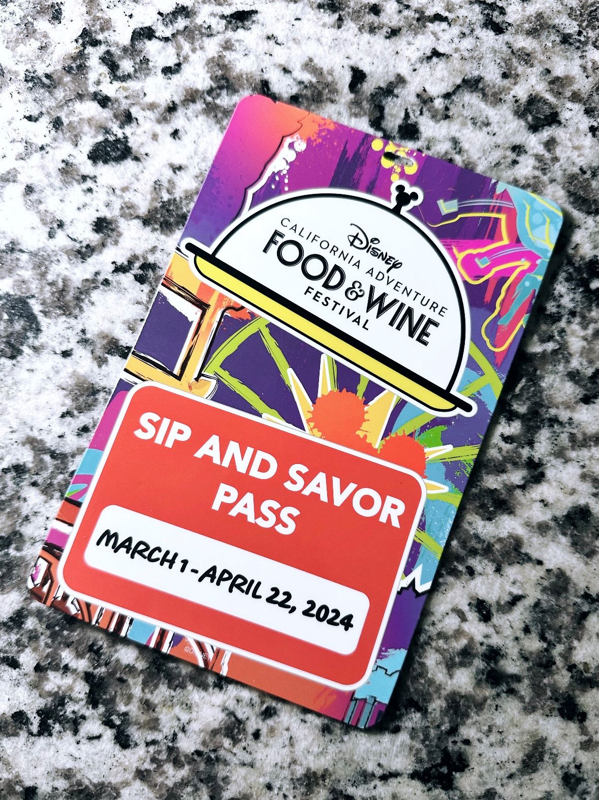An image of the Disney California Adventure Food & Wine Festival Sip and Savor pass.