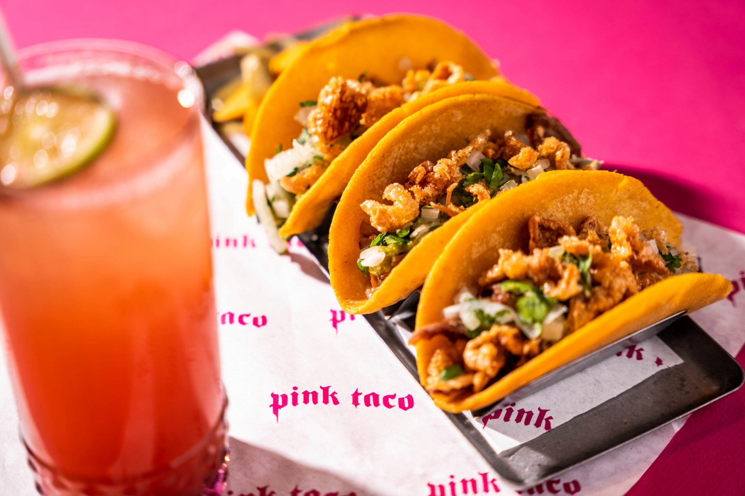 An image of 3 tacos from Pink Taco.