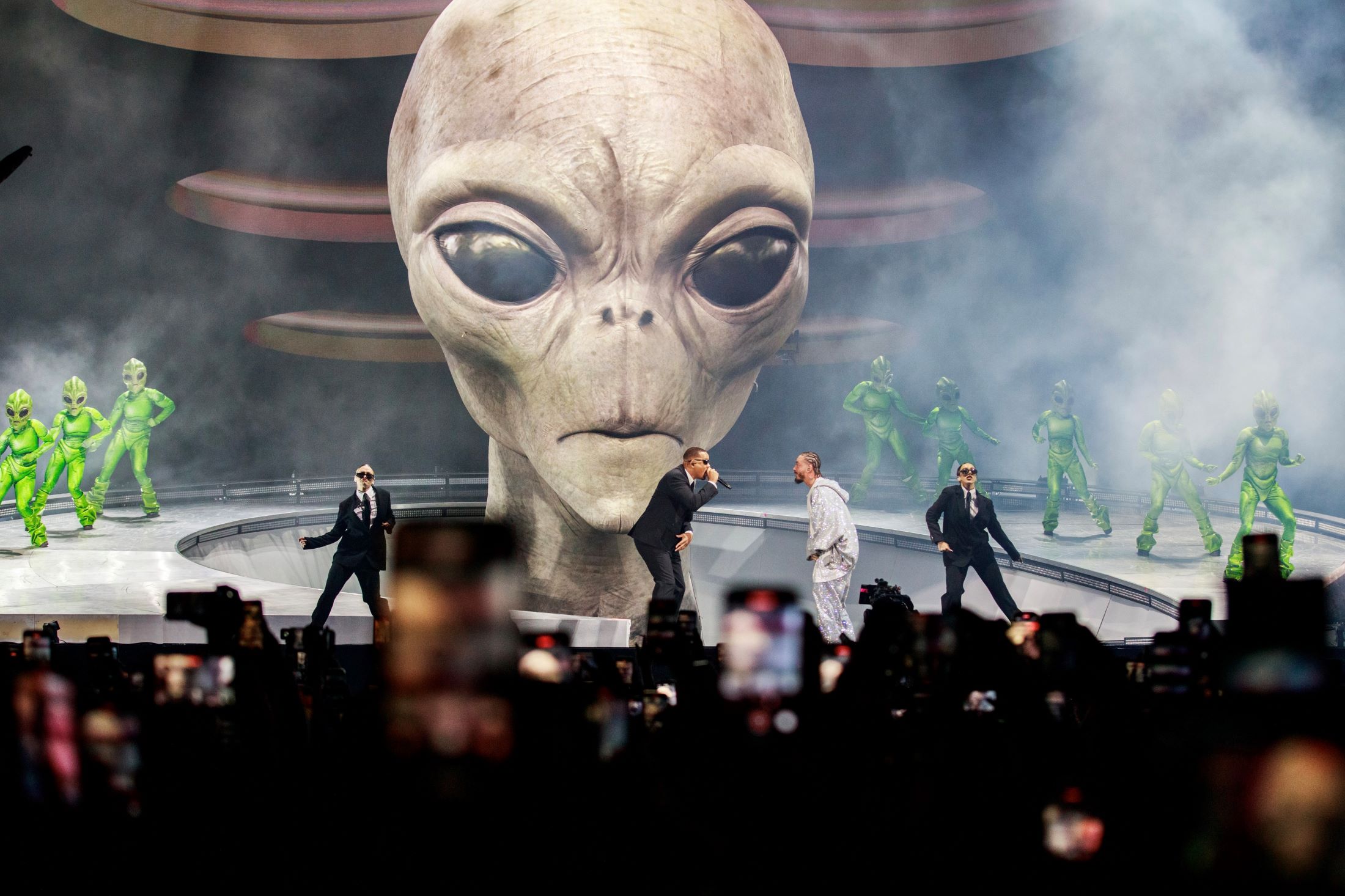 An image of Will Smith and J Balvin on stage at Coachella performing "Men in Black."