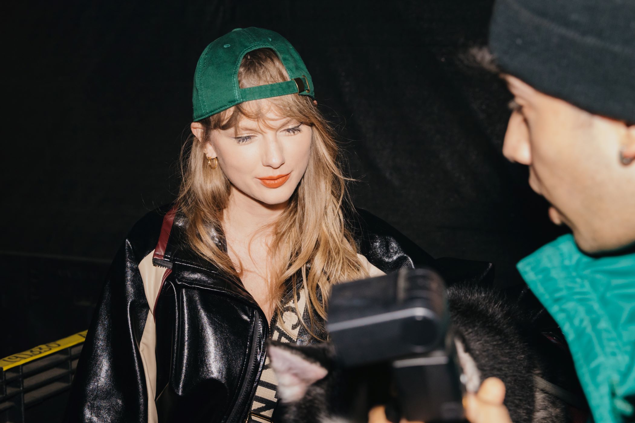 An image of Taylor Swift at Neon Carnival.