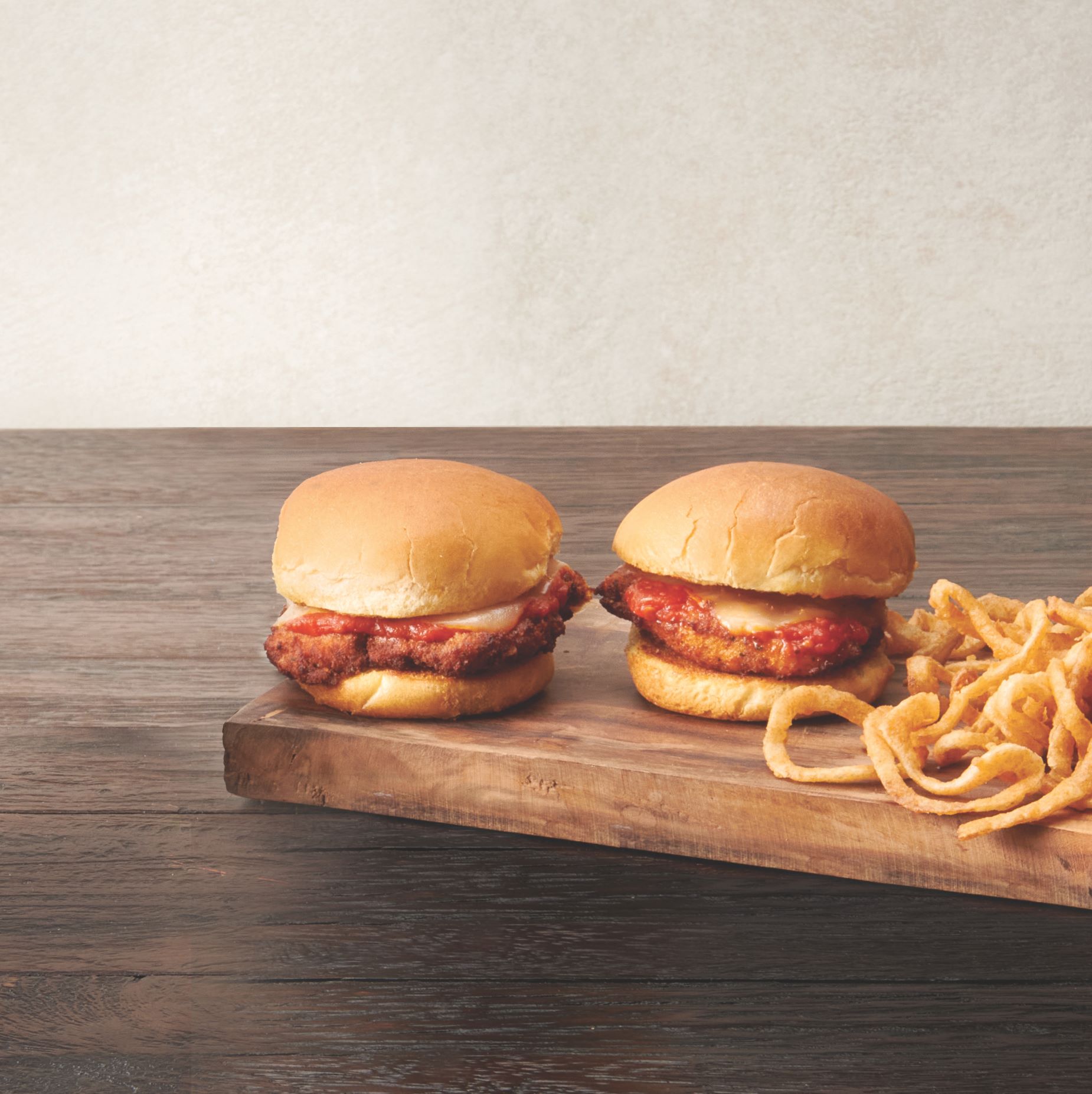 An image of Chicken Parmigiana Sliders from The Palm.