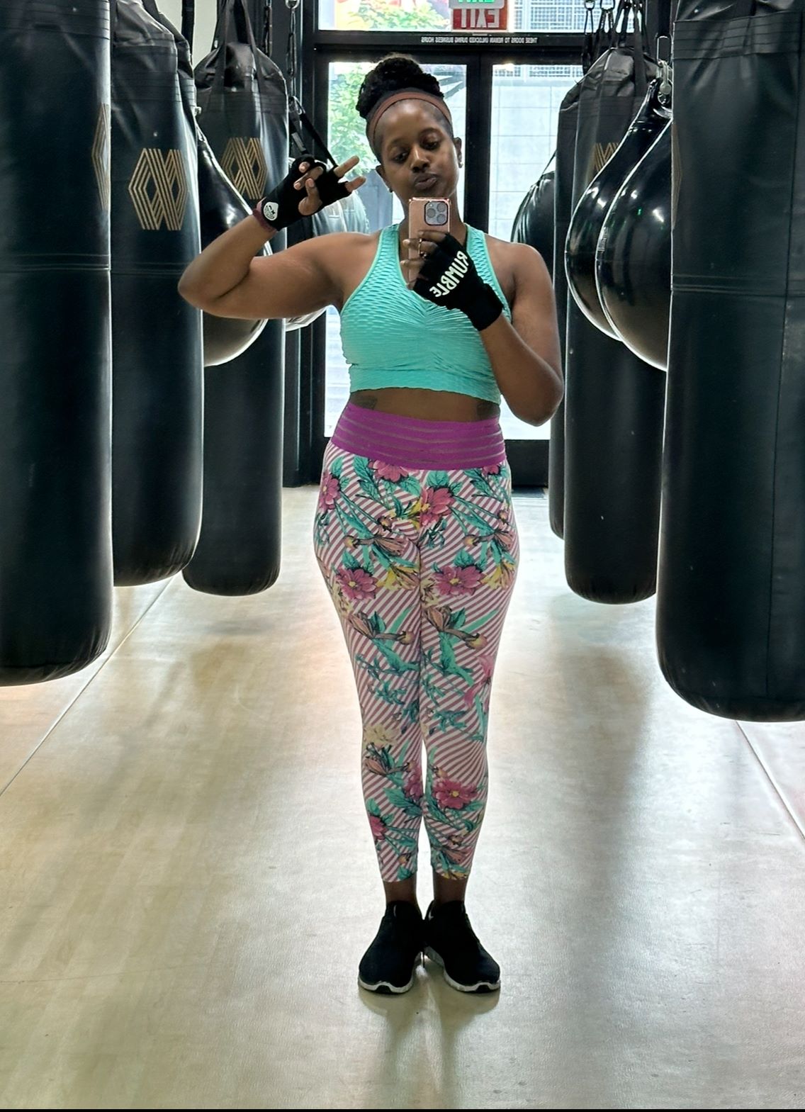 An image of lifestyle blogger Ariel sculpting her summer body at Mayweather Boxing and Fitness. 