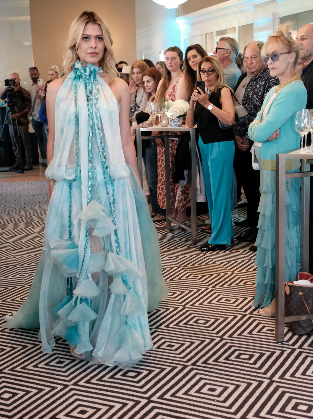 An image of a model wearing ocean-inspired sustainable couture.