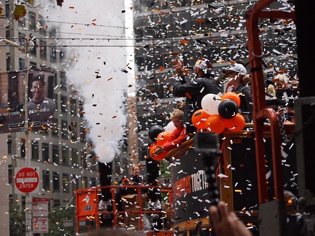 An image of confetti and balloons at the Macy's Thanksgiving Day Parade.