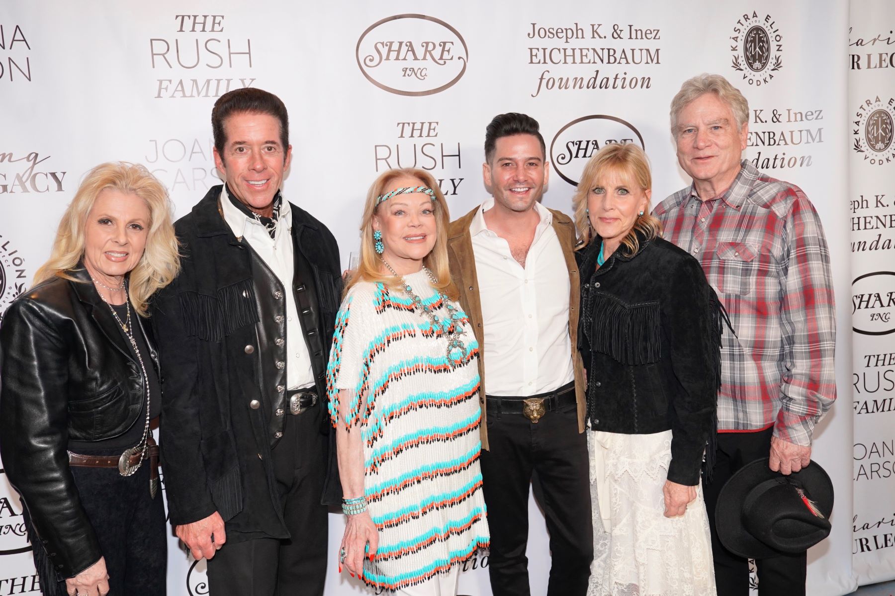 An image of celebrity guests Linda and Ross Kemper. Candy Spelling, Josh Flagg, Rochelle and Rich Maize. 
