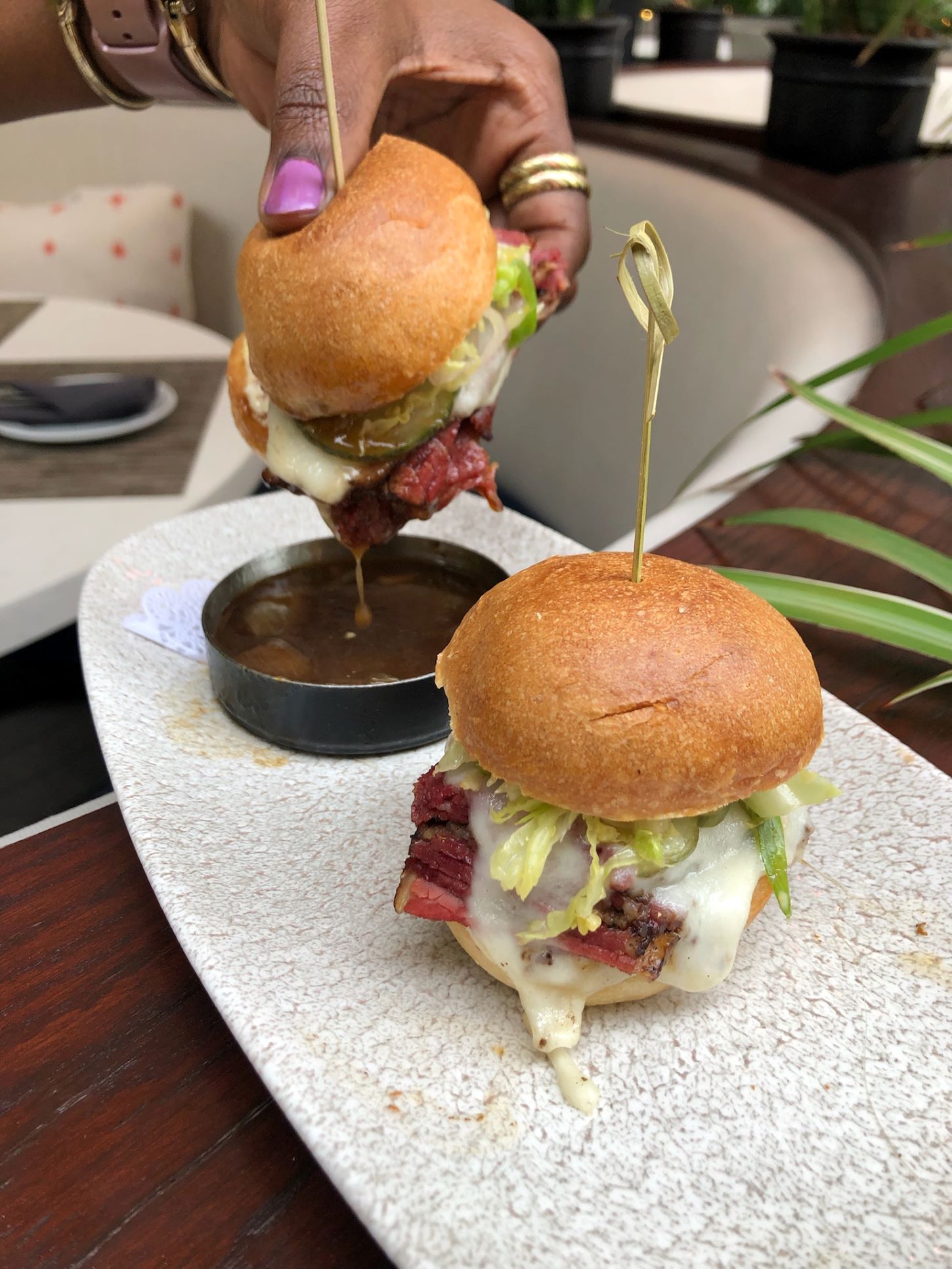 An image of the new Short Rib Sliders from Ocean Prime's new happy hour menu.