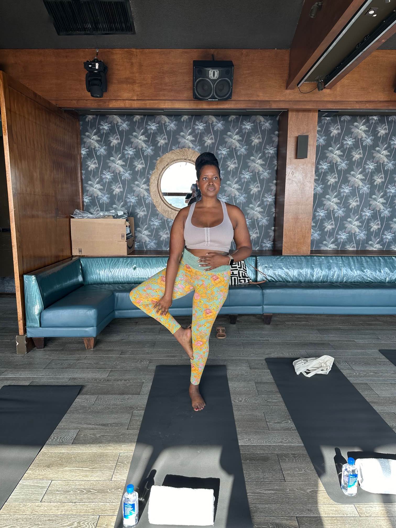 An image of lifestyle blogger Ariel in a yoga pose before she partook in a sound bath meditation.