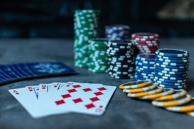 An image of poker chips and cards.
