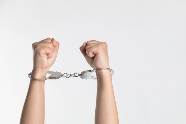 An image of a person in handcuffs.