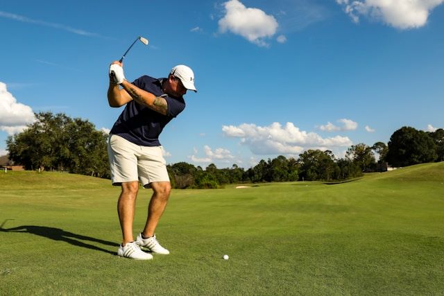 An image of a golfer on a golf course.