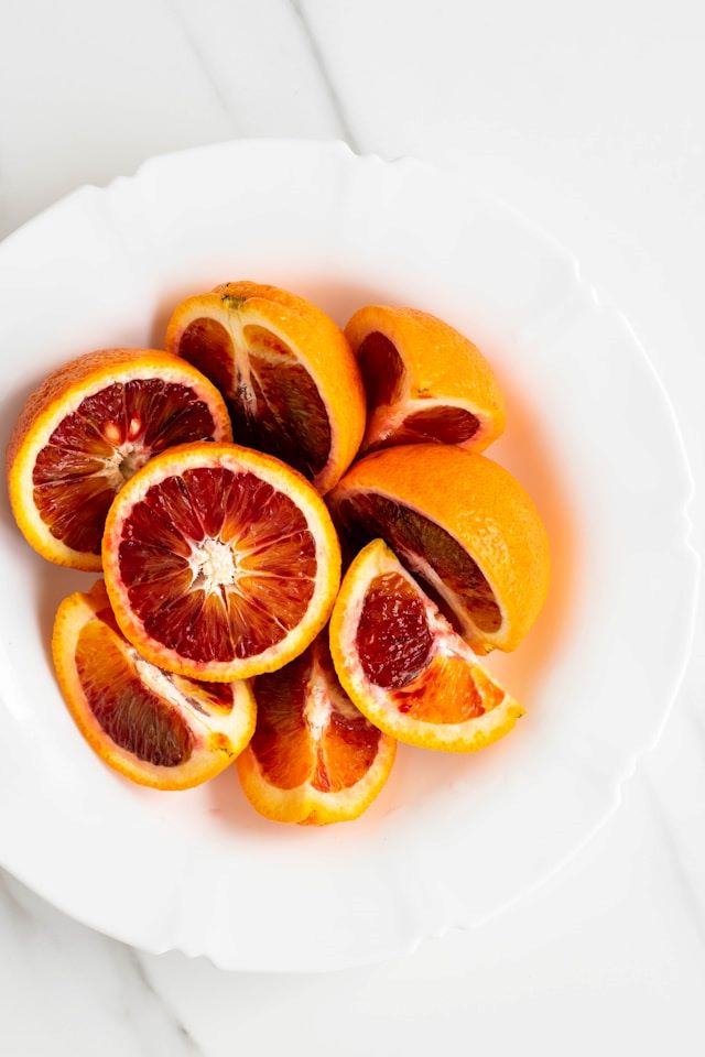 An image of a bowl of blood oranges.