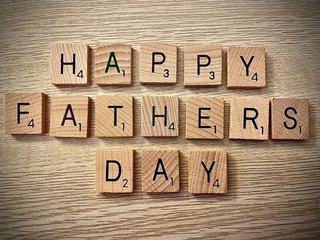 An image of scrabble letters that spell out Happy Father's Day